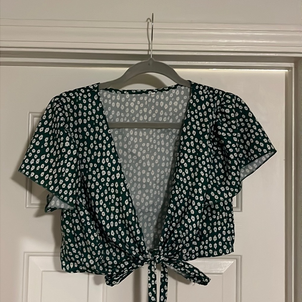 Green shirt with flowers